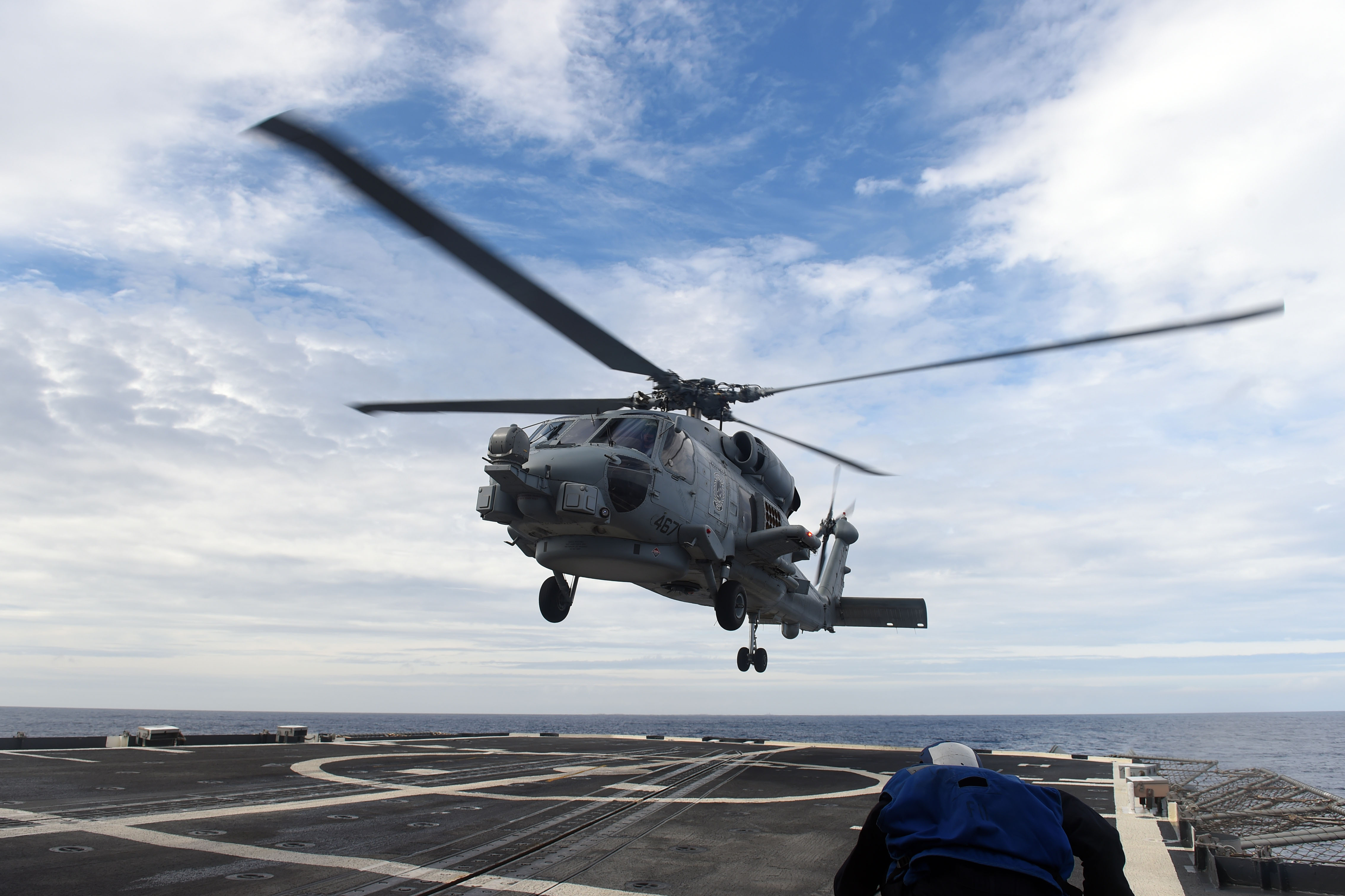 US Navy Romeo Hovering over a DDG