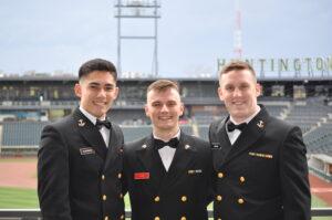 Three ROTC cadets stand at Huntington Park, home of the Columbus Clippers.